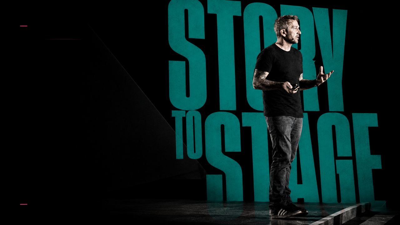 Speaker on stage delivering a talk